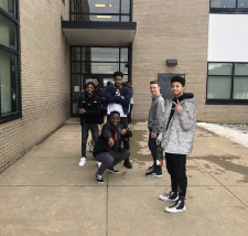 photo of the men of color network volunteers in front of Jefferson Elementary School